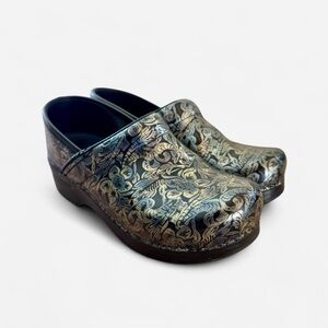 Dansko antique floral patterned leather black clogs